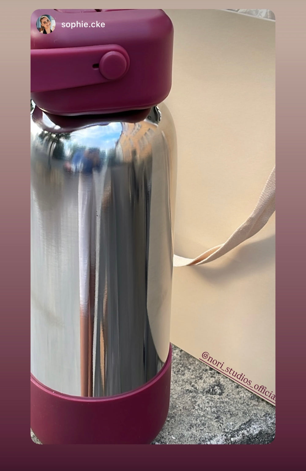 Mirror-finish nori bottle with a berry cap and boot